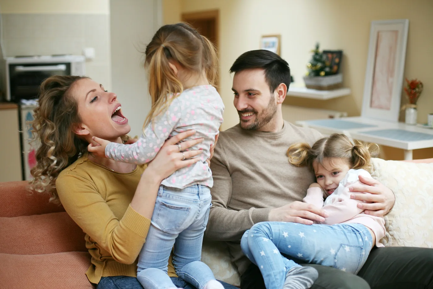 Adults and children spending time together at home